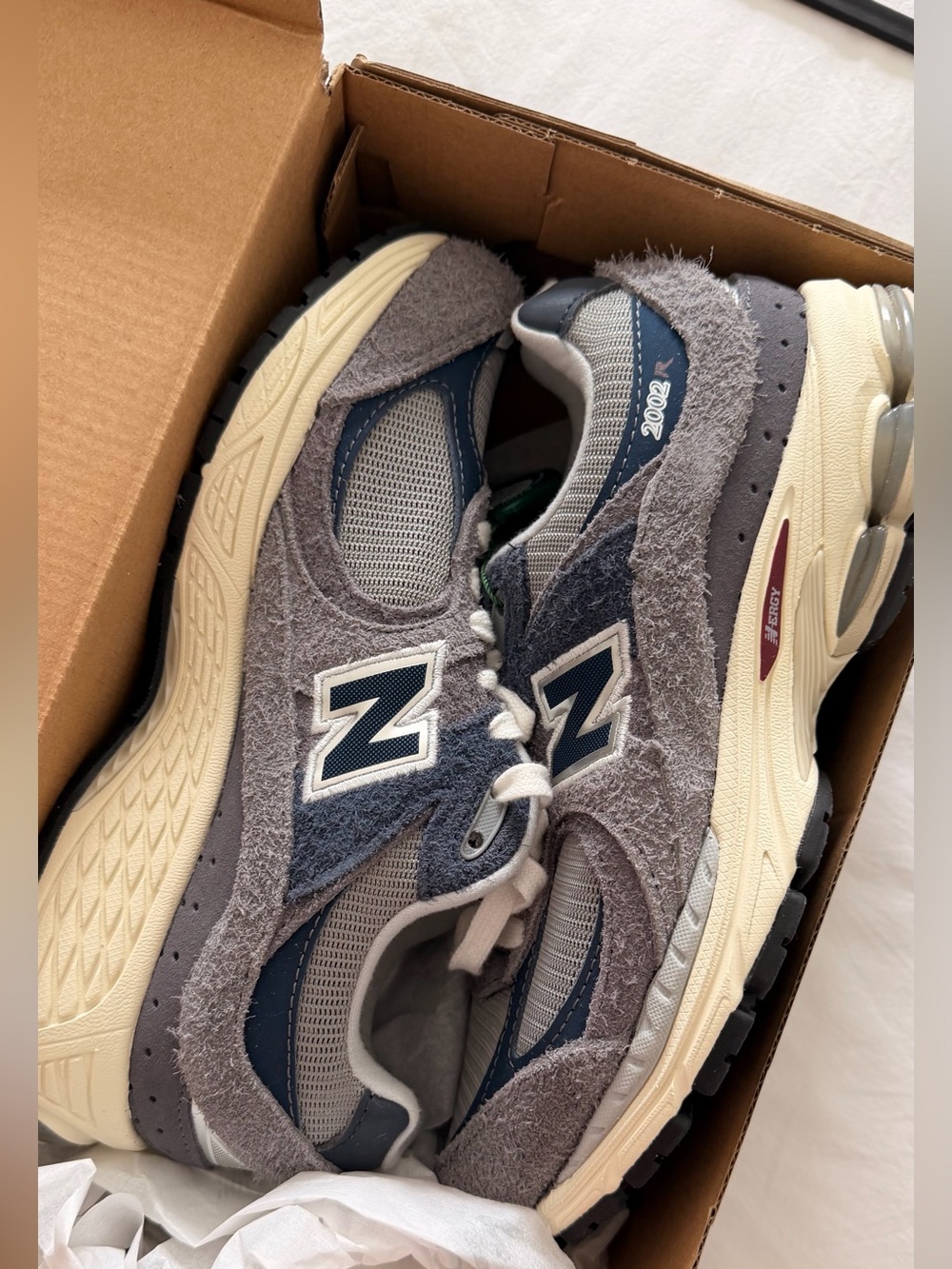 New Balance women's Gray & Navy 2002R Textured Suede Sneakers